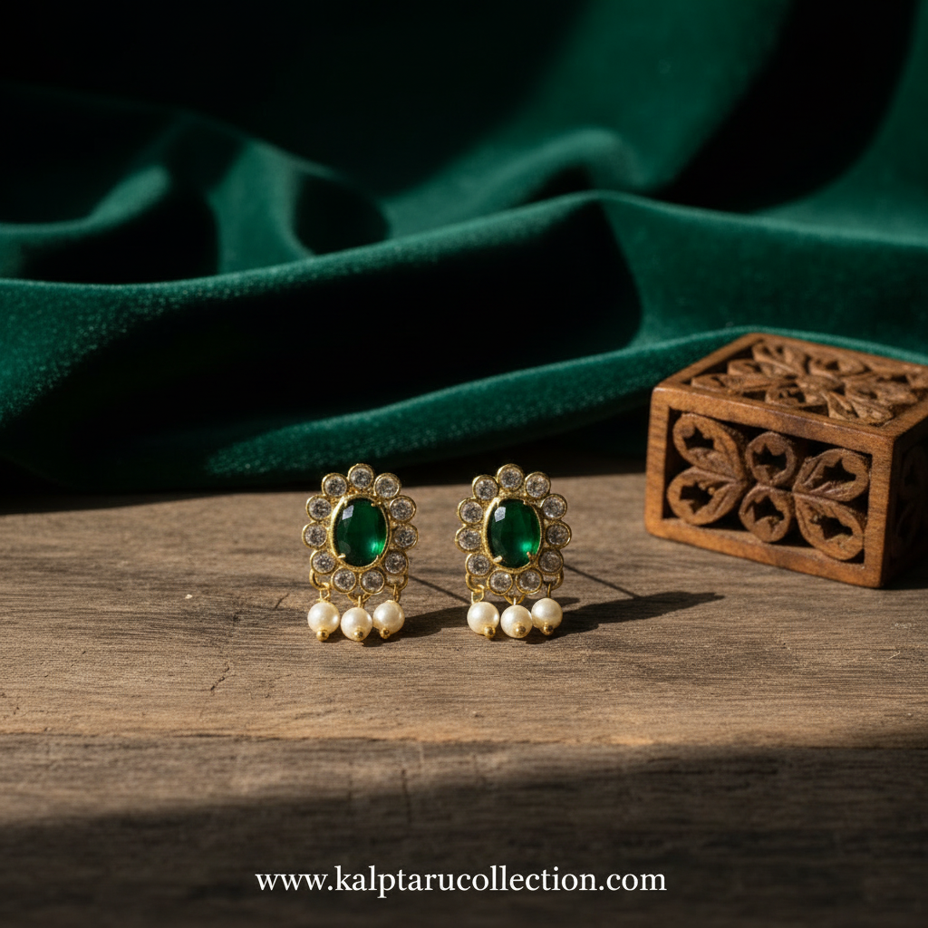 Traditional green stone stud earrings with pearl drops for women by Kalptaru Collection