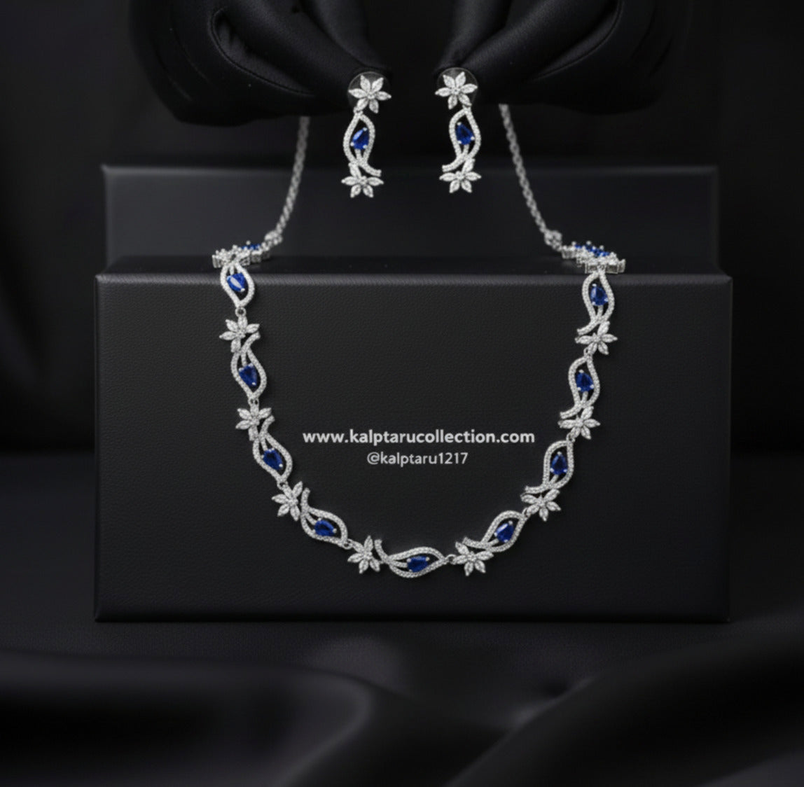 Blue stone diamond finish necklace set with earrings by Kalptaru Collection