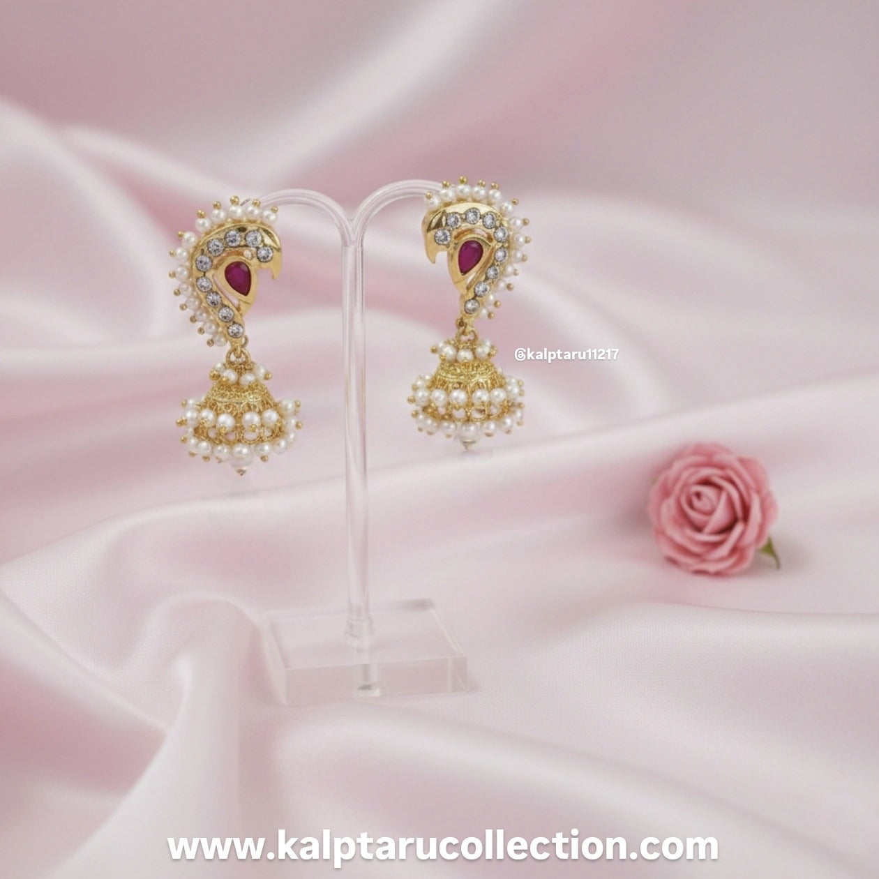 Traditional peacock pearl jhumka gold look jewelry by Kalptaru Collection