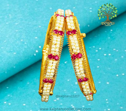 Traditional Maharashtrian Kolhapuri bangles for women in gold with pearls from Kalptaru Collection