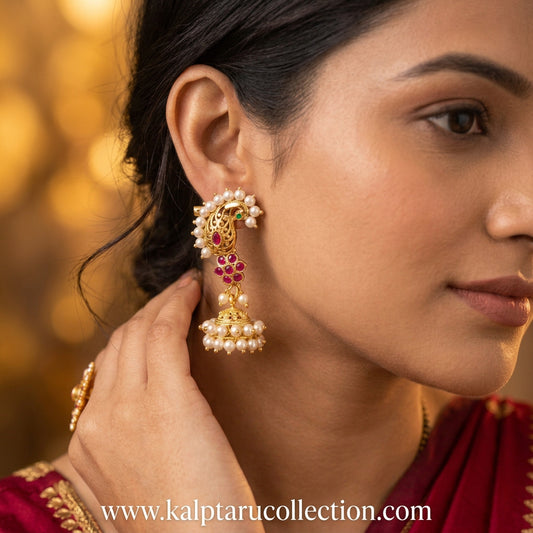 Shop traditional Maharashtrian Intricate ruby stone peacock motif with pearl drops peacock jhumka paired with rich bridal silk saree - Kalptaru Collection